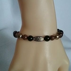 Brown, black, and gold beaded stretch bracelet
